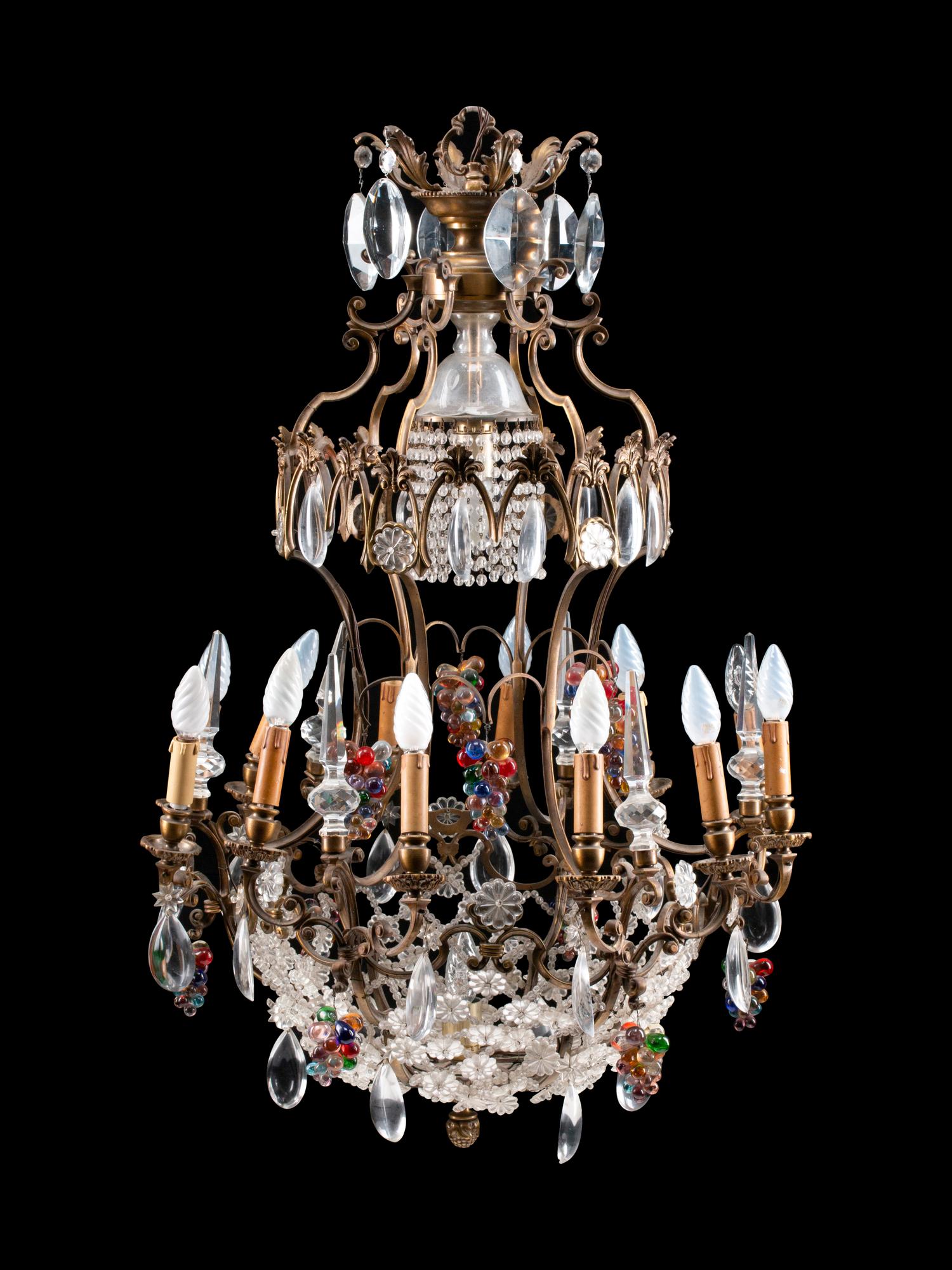A Louis XV Style Patinated Bronze, Cut and Colored Glass Fourteen-Light Chandelier