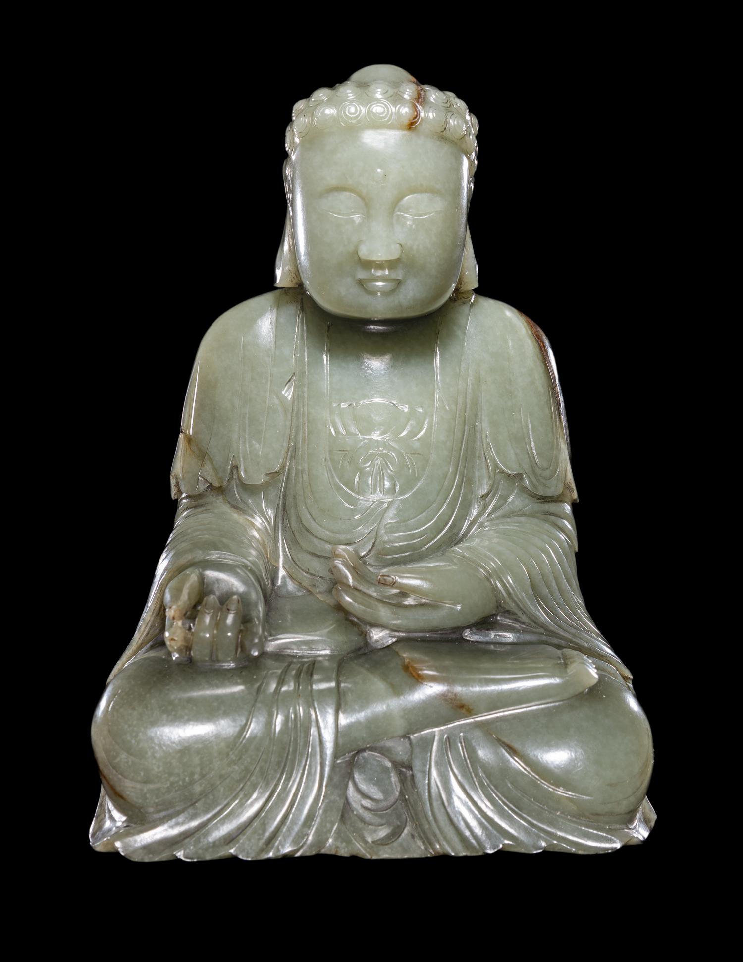 A Chinese Celadon Jade Figure of Medicine Buddha