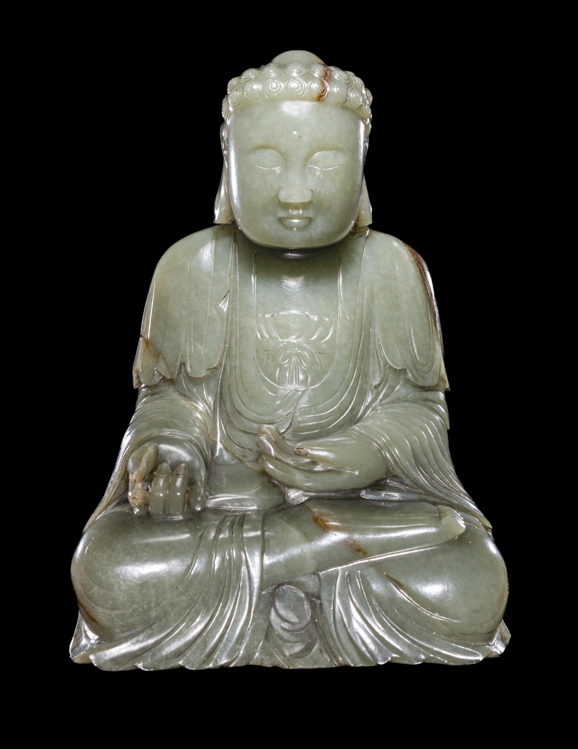 A Chinese Celadon Jade Figure of Medicine Buddha