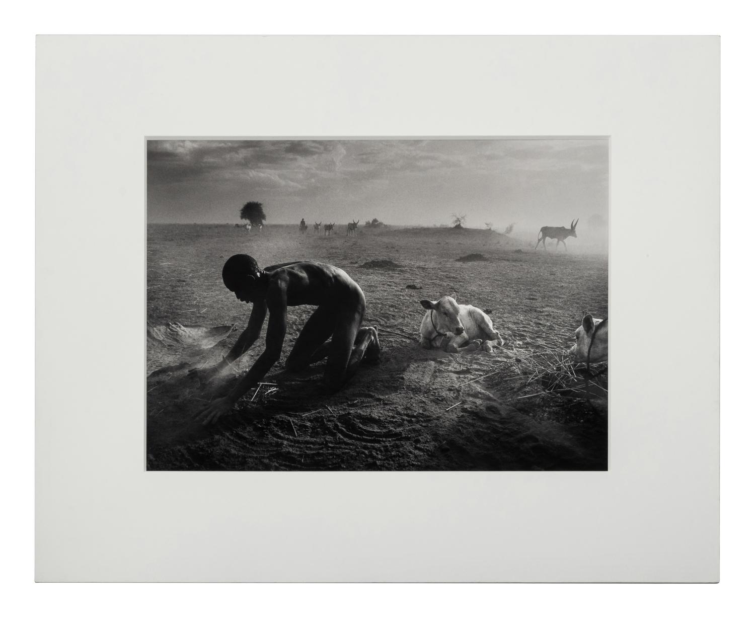 Sebastião Salgado (born 1944) Dinka Cattle Camp, Wutliet, Sudan, Africa, 2006