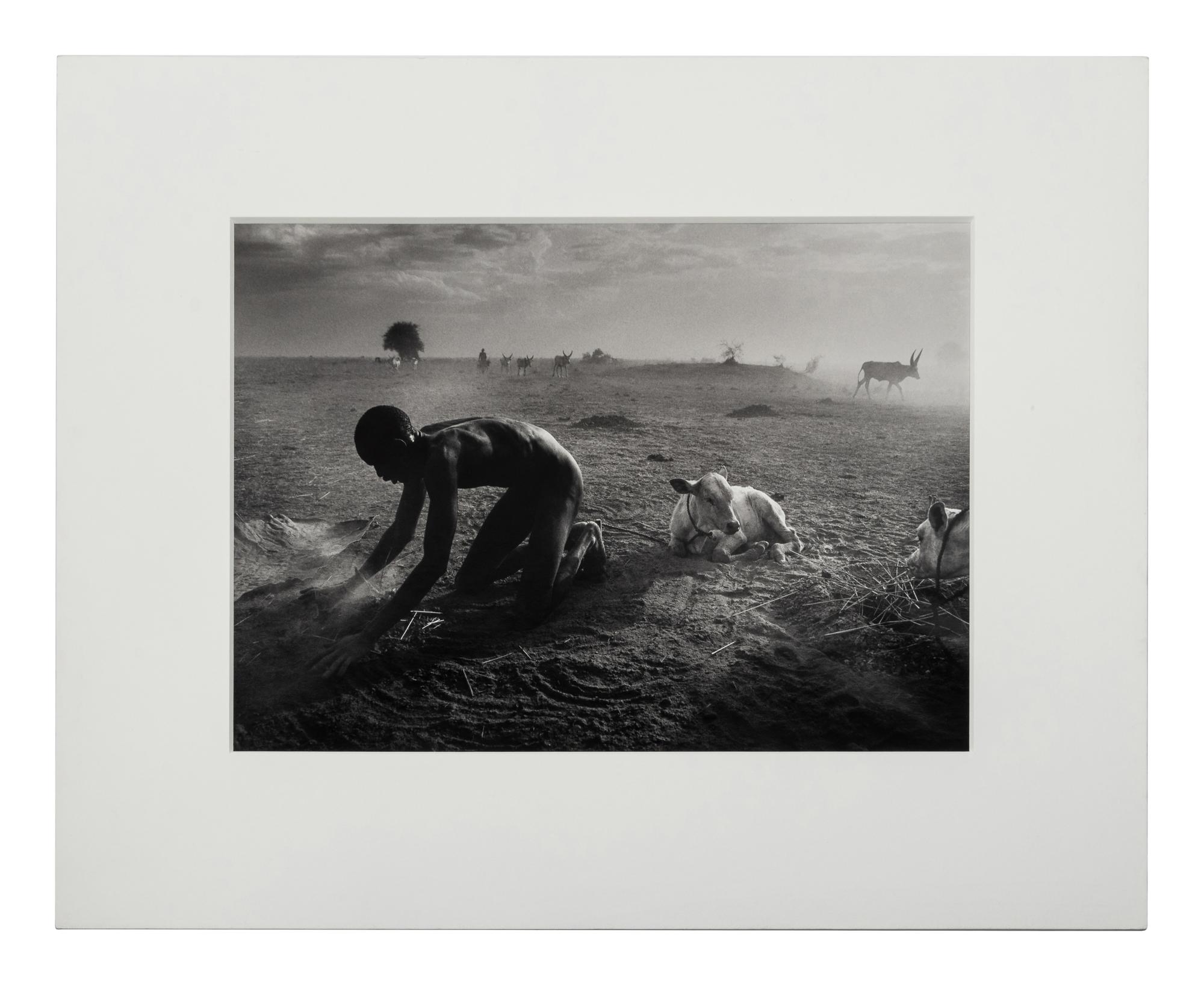 Sebastião Salgado (born 1944) Dinka Cattle Camp, Wutliet, Sudan, Africa, 2006