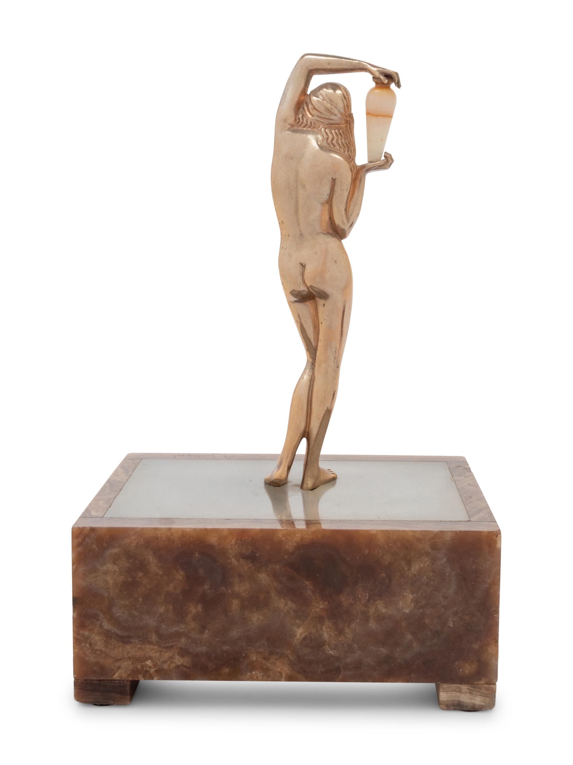 A Continental Onyx and Gilt Metal Figural Lamp