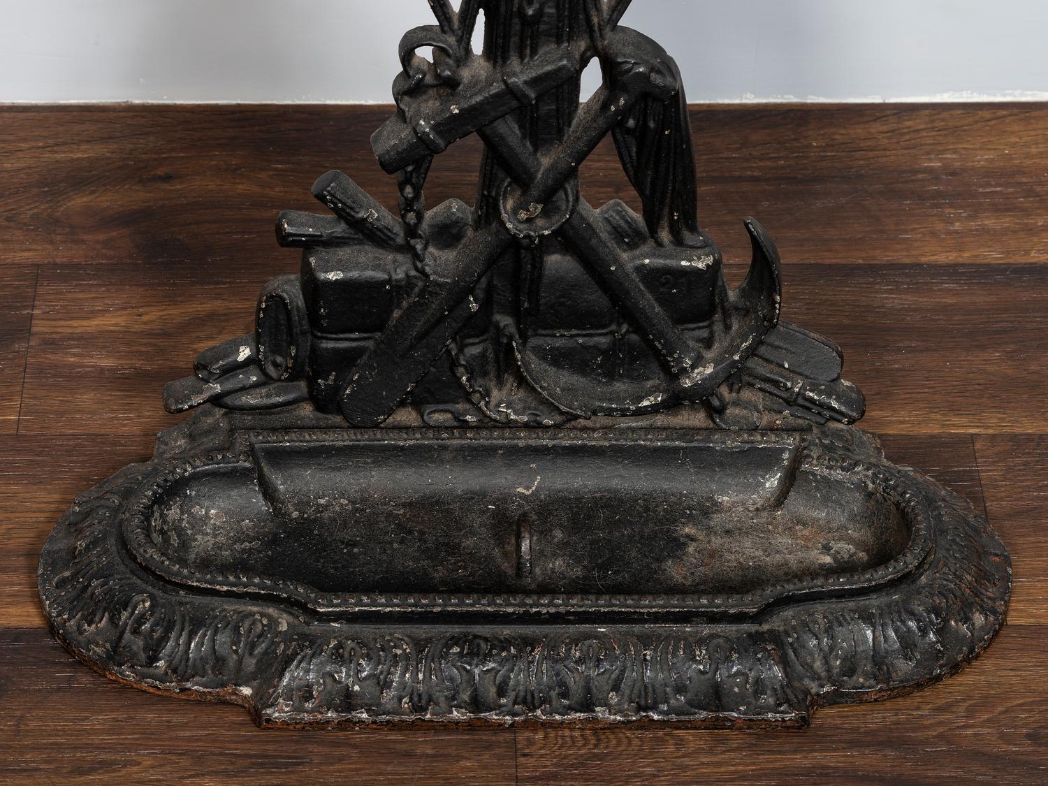 A Victorian Cold Painted Iron Umbrella Stand with Sailor Figure