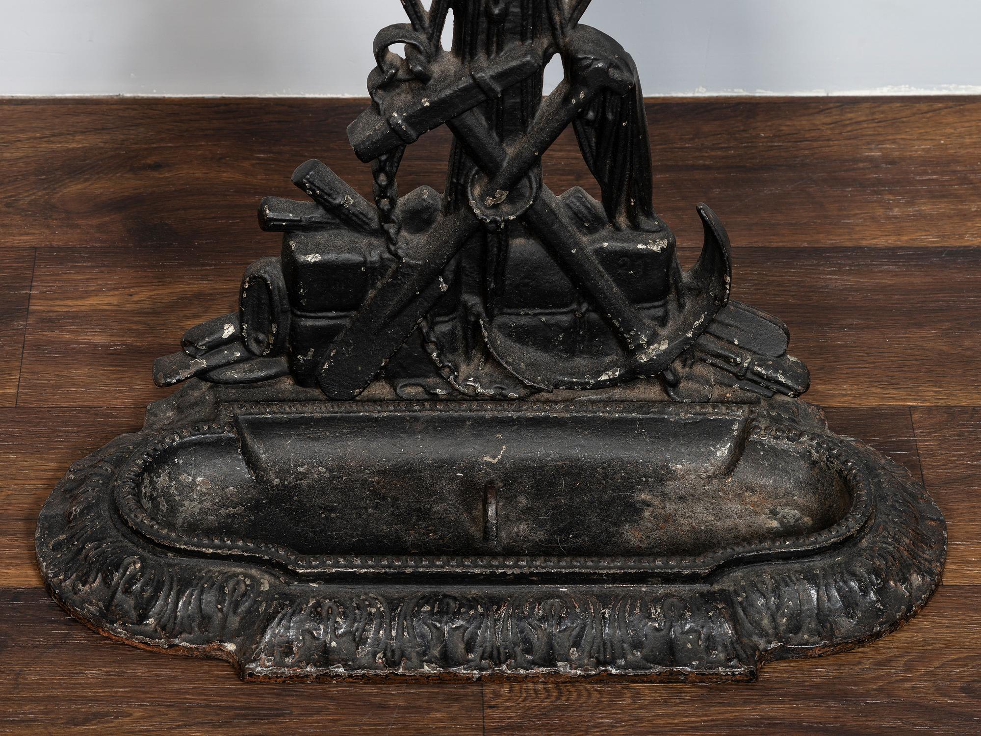 A Victorian Cold Painted Iron Umbrella Stand with Sailor Figure