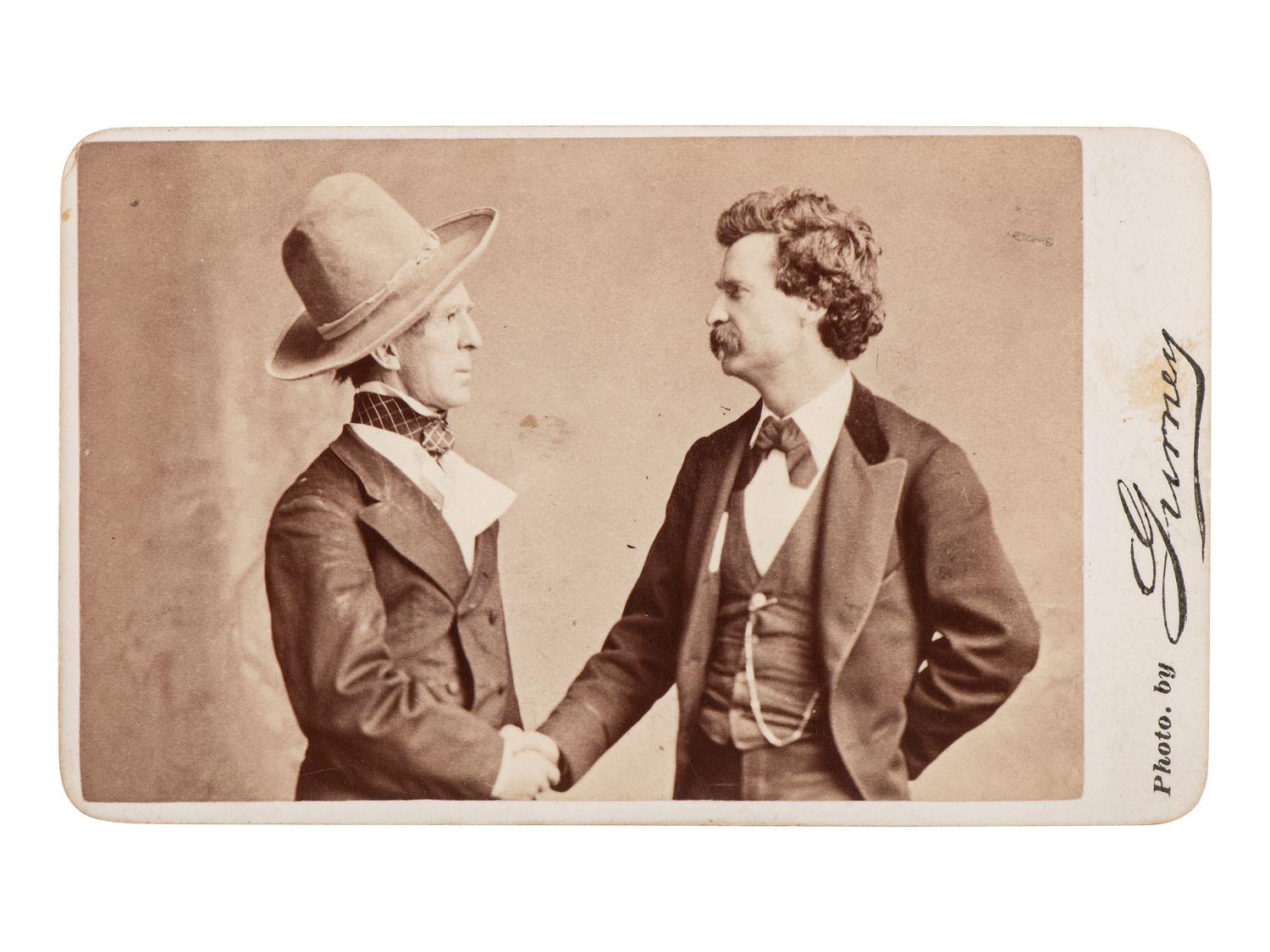 [EARLY PHOTOGRAPHY]. GURNEY, Jeremiah (1812-1895), photographer. CDV of Mark Twain and John T. Raymond. New York: J.H. Goldsmid, n.d.