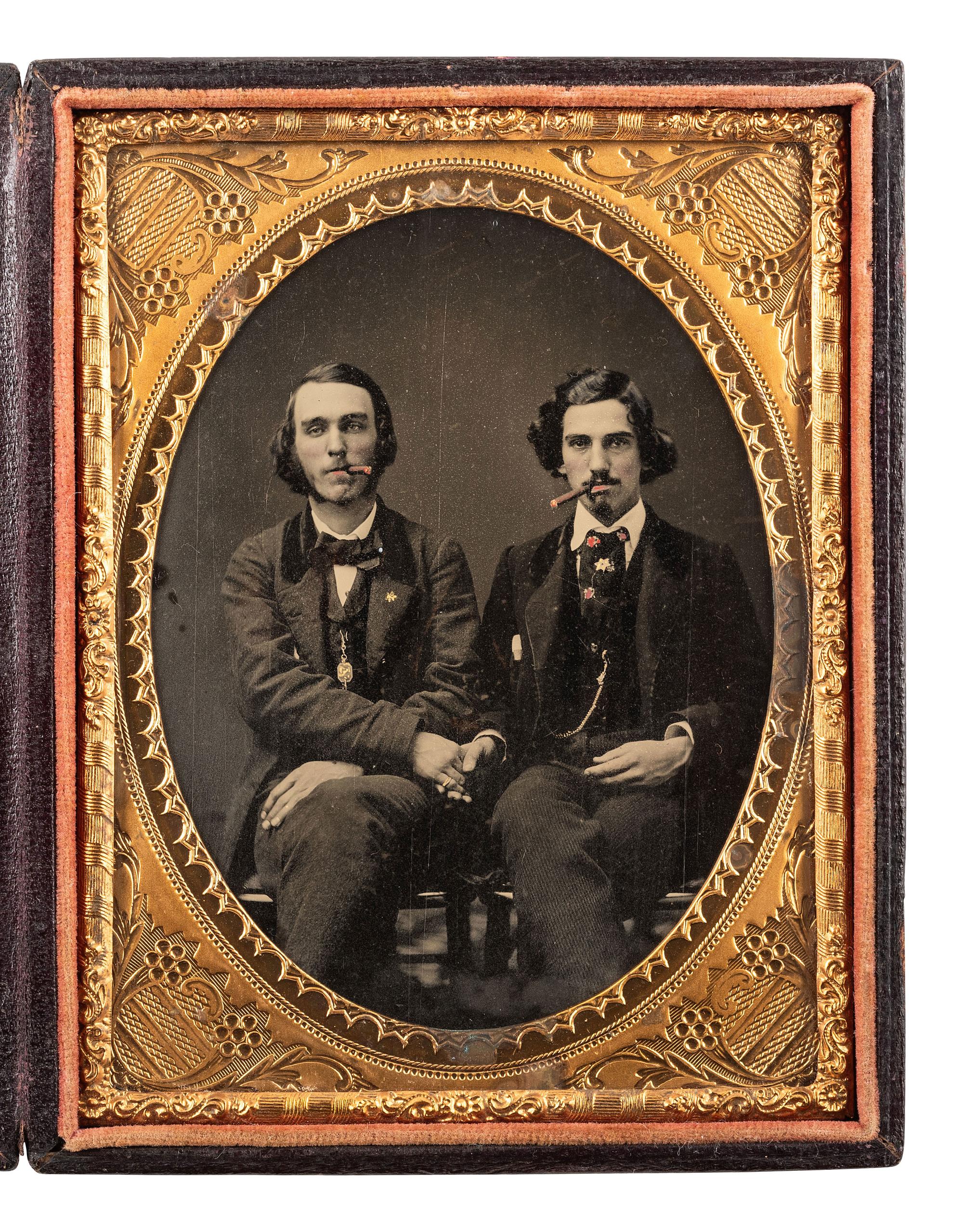 [CIVIL WAR]. Quarter plate ambrotype of two men, possibly brothers, affectionately posed together enjoying a smoke.