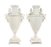 A Pair of Continental Blanc-de-Chine Vases Height 14 1/2 inches. — 19TH CENTURY