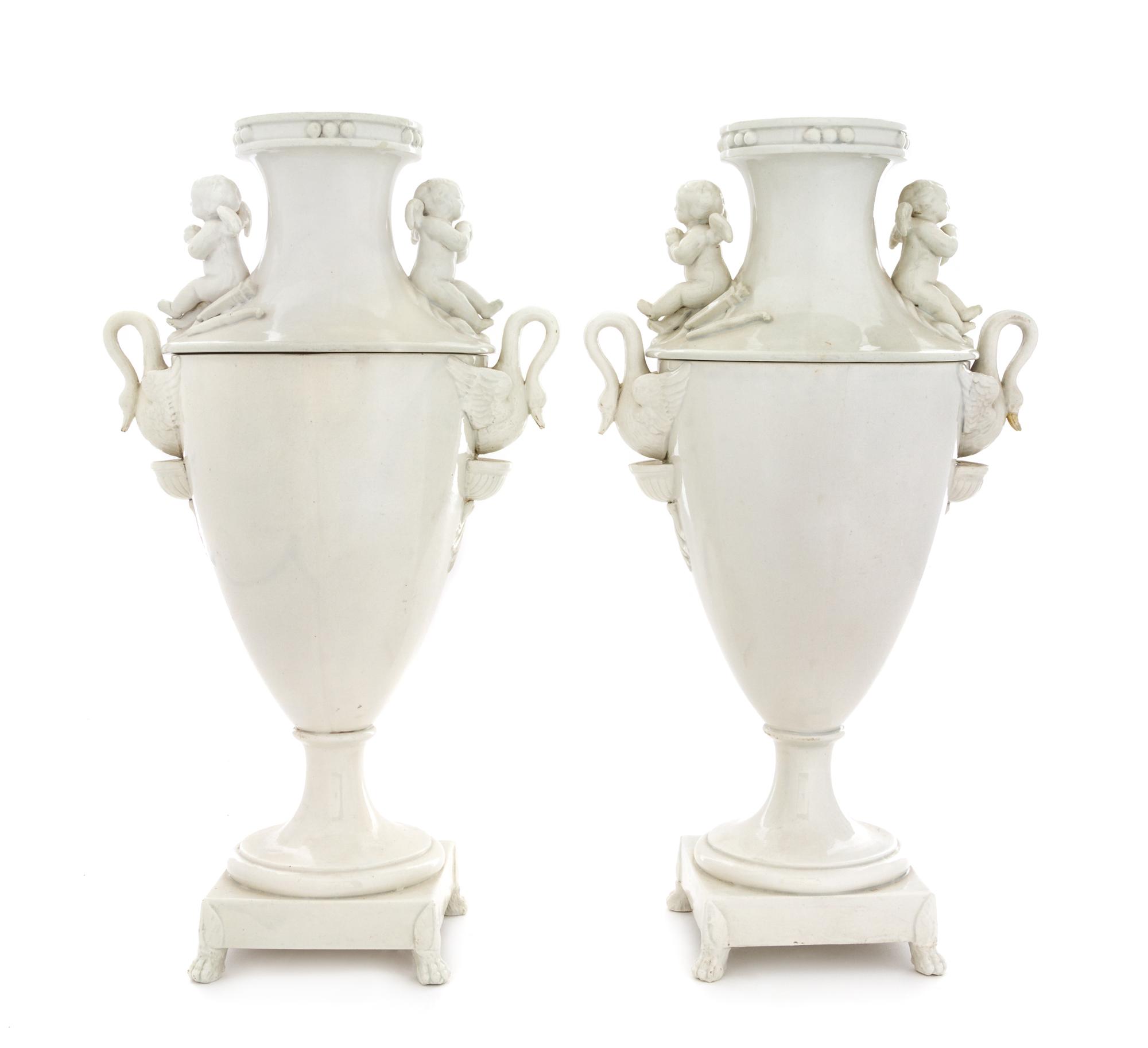 A Pair of Continental Blanc-de-Chine Vases Height 14 1/2 inches. — 19TH CENTURY