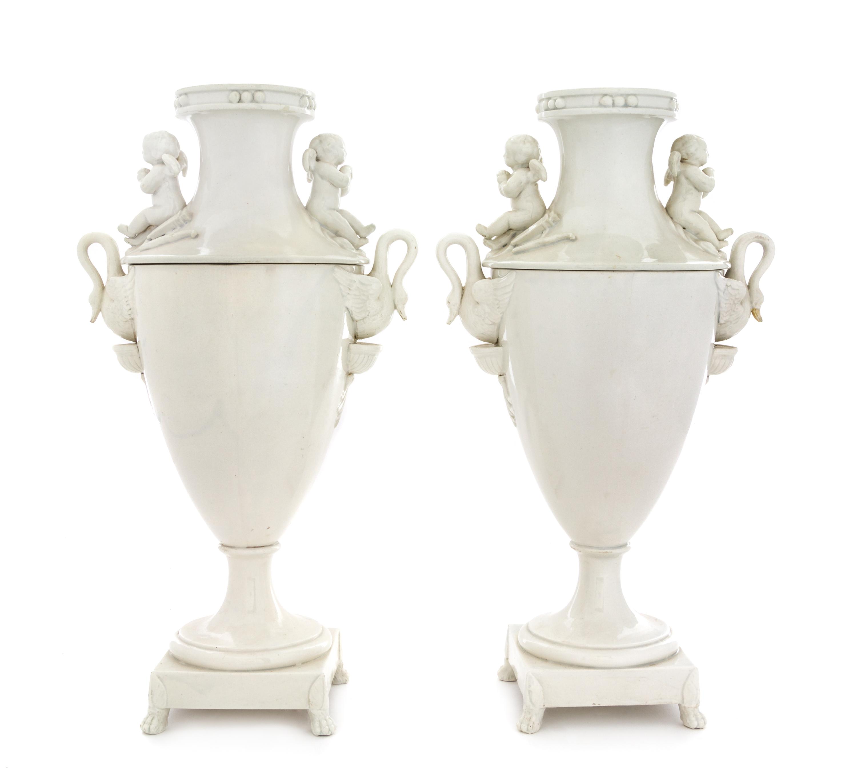 A Pair of Continental Blanc-de-Chine Vases Height 14 1/2 inches. — 19TH CENTURY