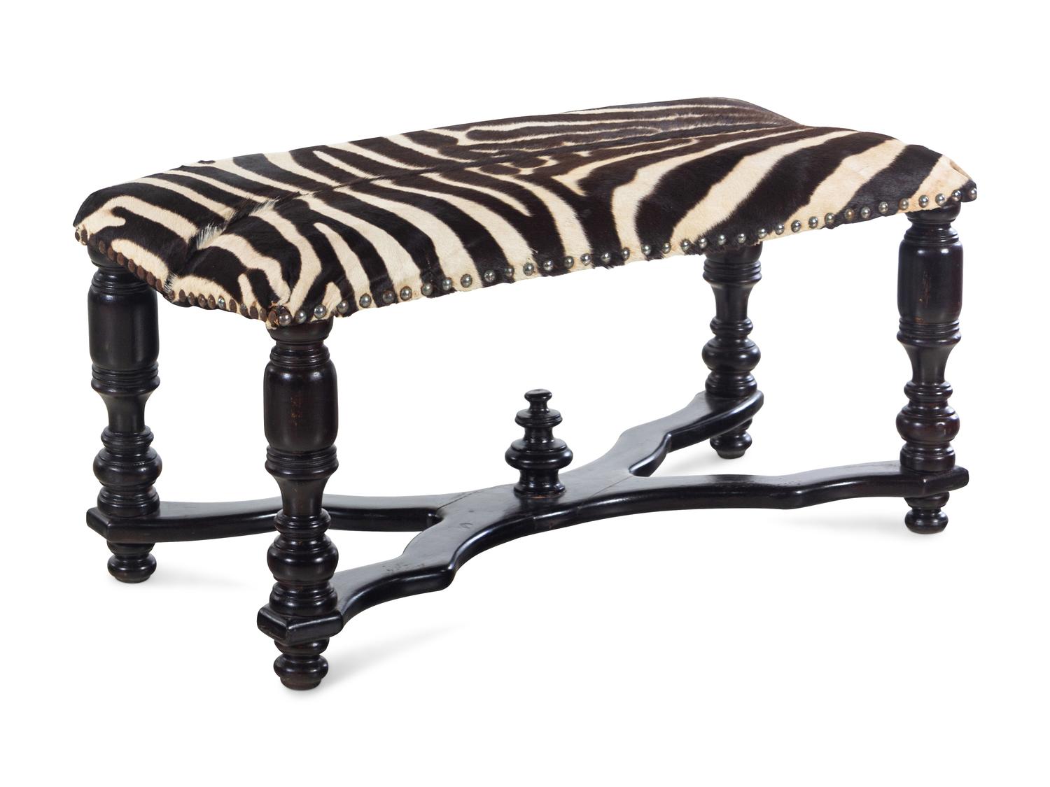 A William IV Ebonized Wood Zebra Hide Upholstered Bench