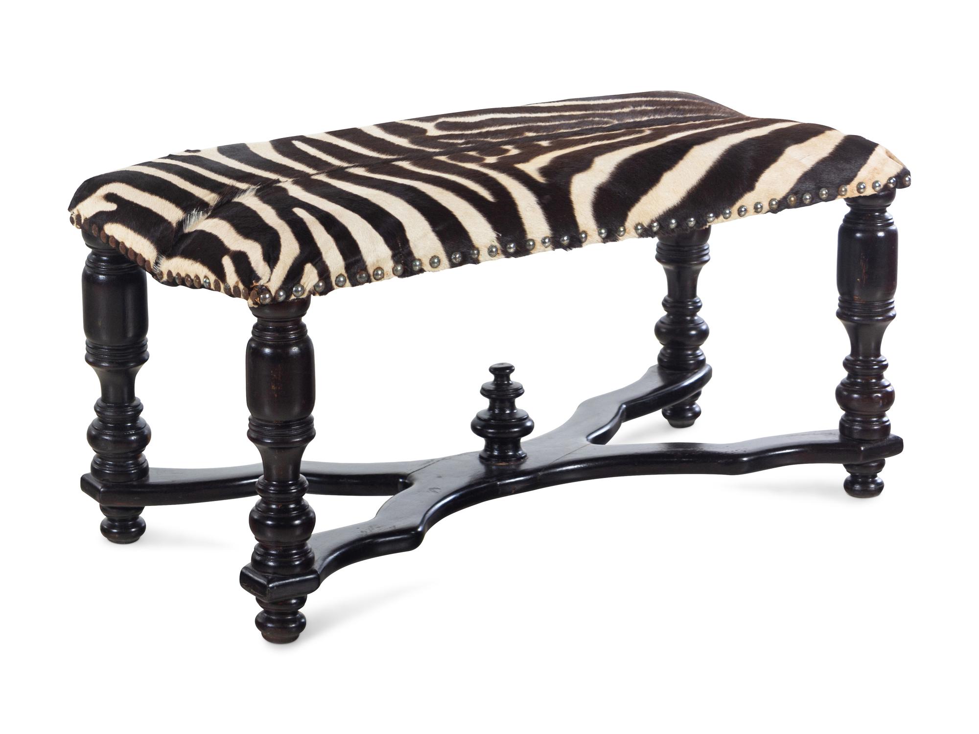 A William IV Ebonized Wood Zebra Hide Upholstered Bench