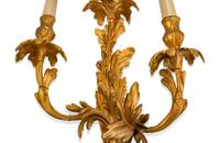 A Pair of Louis XV Style Gilt-Bronze Three-Light Sconces