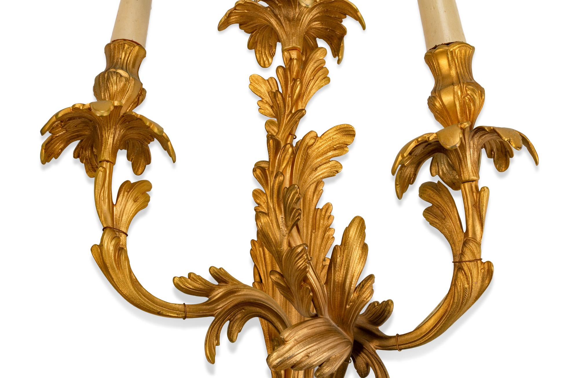 A Pair of Louis XV Style Gilt-Bronze Three-Light Sconces