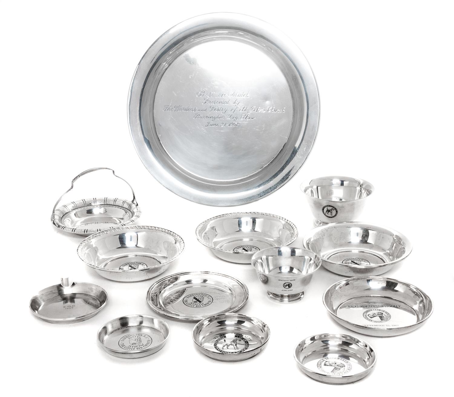 Fourteen American Silver Airedale Terrier Articles, Various Makers, comprising a variety of trophy bowls and trays.