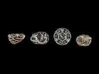 Four Chinese Celadon Jade Reticulated Carvings