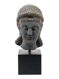 A Life Size Gandharan Grey Schist Head of the Goddess Hariti