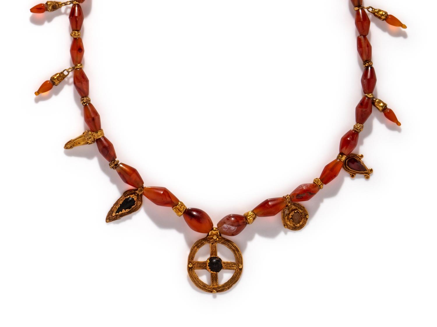 A Hellenistic Gold, Carnelian, and Glass Necklace with Pendants