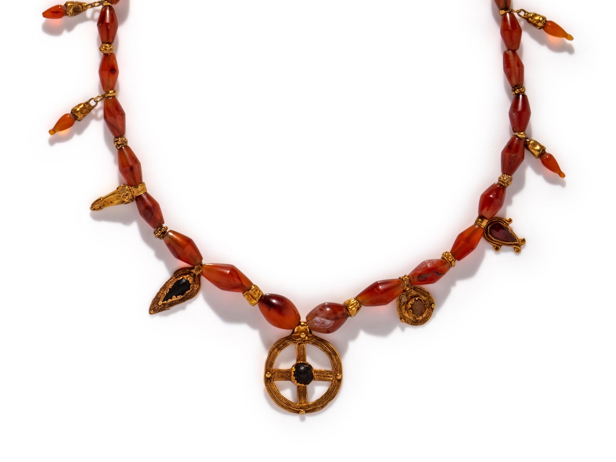 A Hellenistic Gold, Carnelian, and Glass Necklace with Pendants