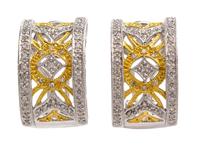 A Pair of 14 Karat Gold and Diamond Earclips, 5.70 dwts.
