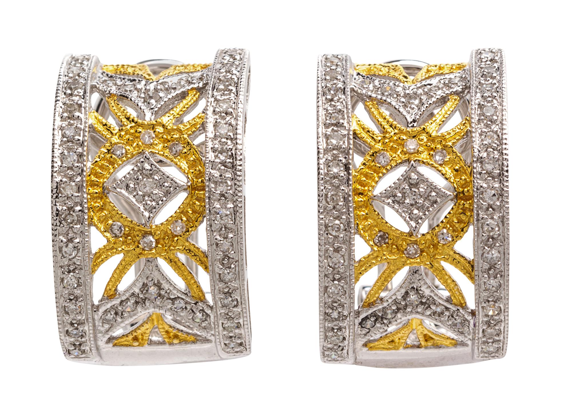 A Pair of 14 Karat Gold and Diamond Earclips, 5.70 dwts.