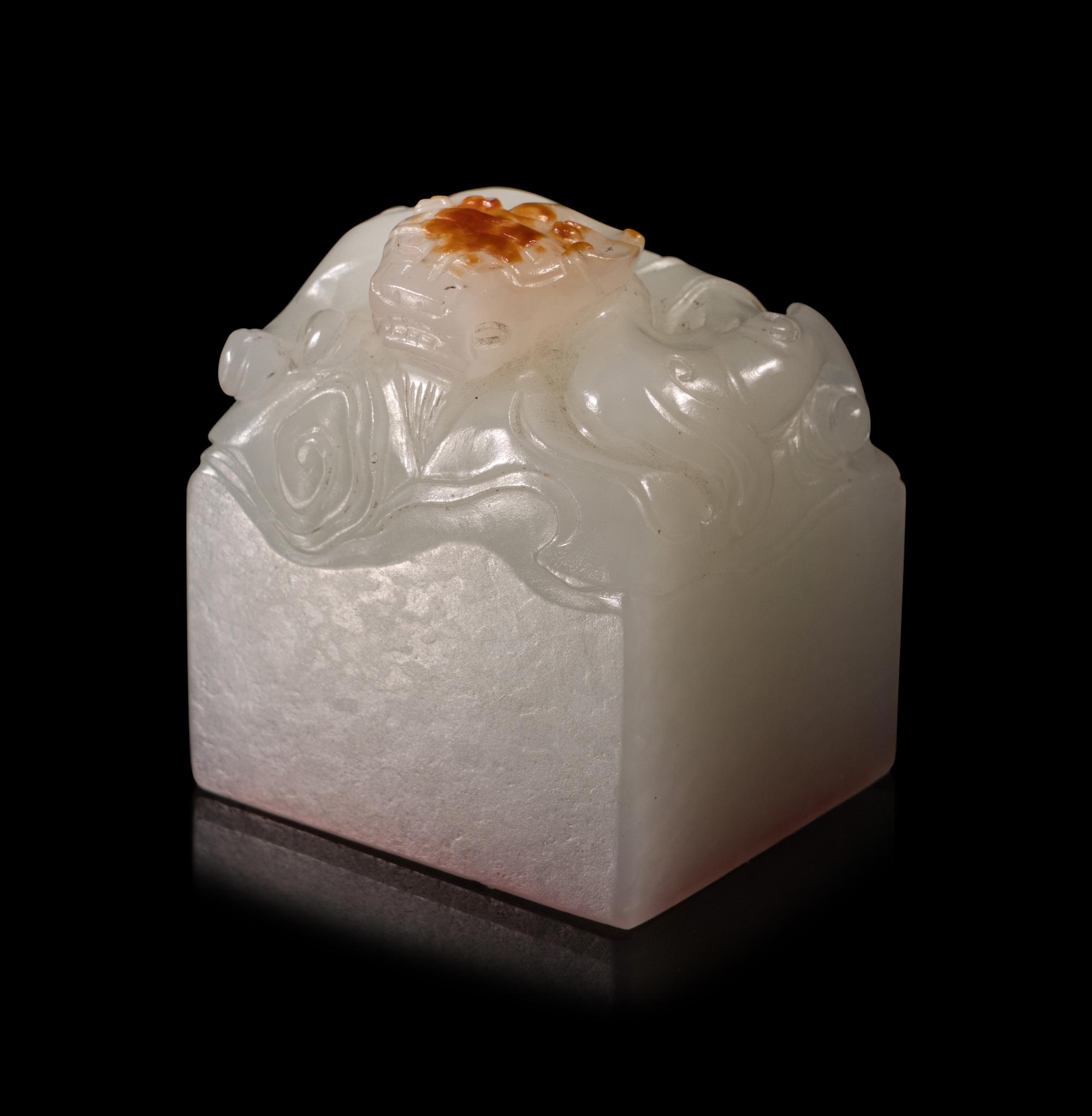 A Carved White Jade Seal