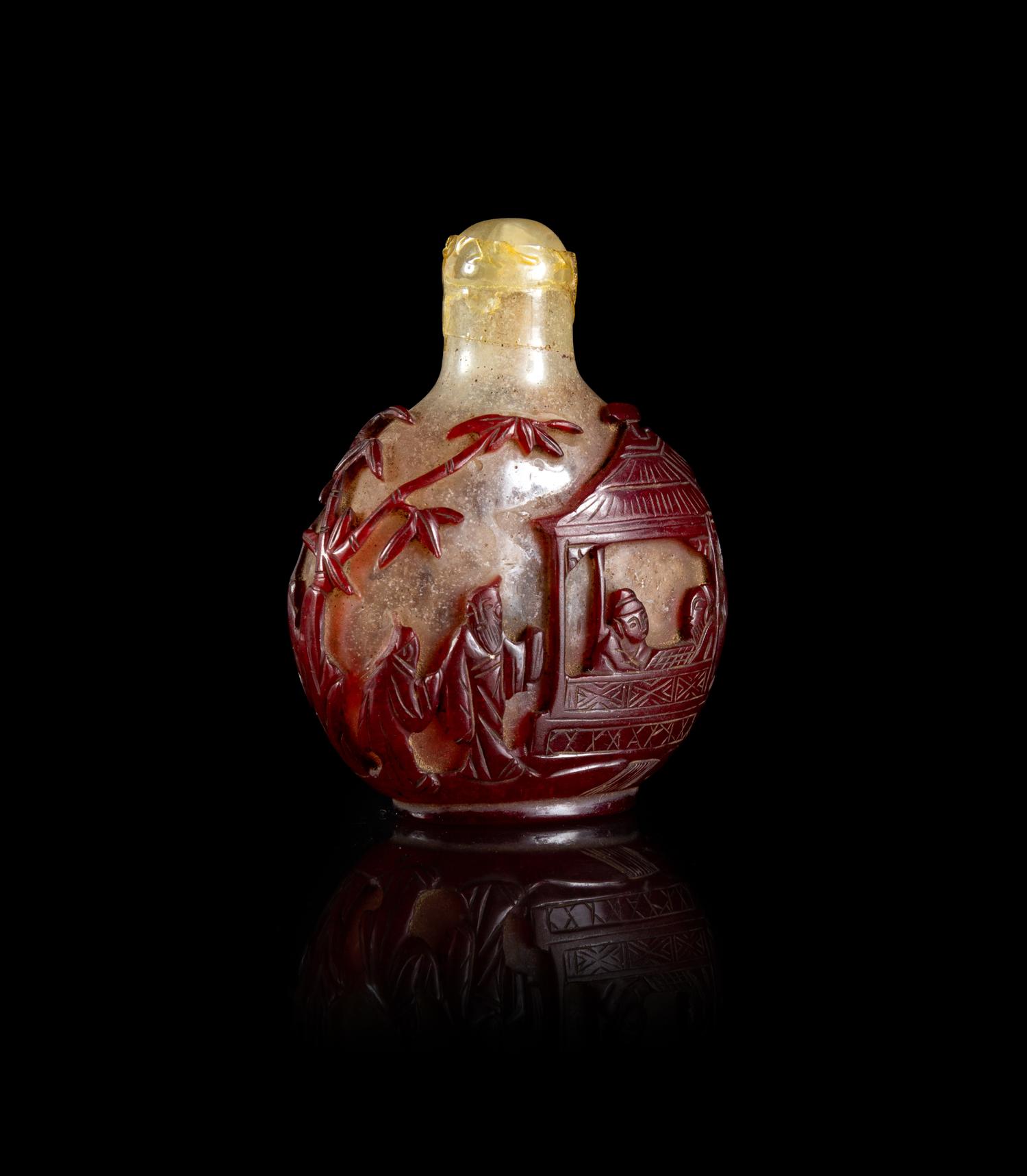 A Chinese Red Overlay Snowflake Ground Glass Snuff Bottle