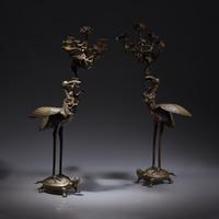 A Pair of Japanese Kaga Style Inlaid Bronze 'Crane and Minogame' Candelabra, Meiji Period — 日本明治時期 銅龜鶴齊齡燭臺一對