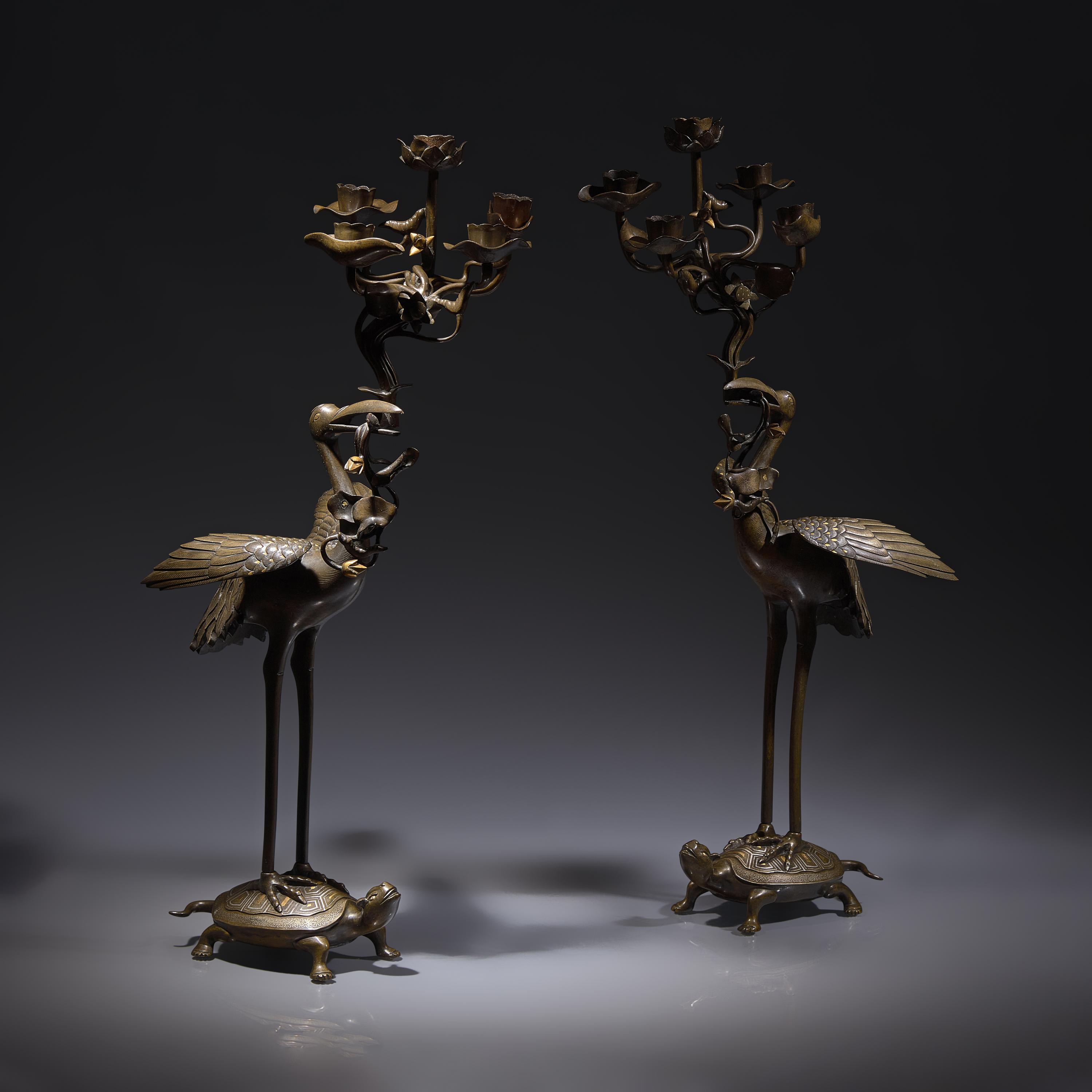 A Pair of Japanese Kaga Style Inlaid Bronze 'Crane and Minogame' Candelabra, Meiji Period — 日本明治時期 銅龜鶴齊齡燭臺一對