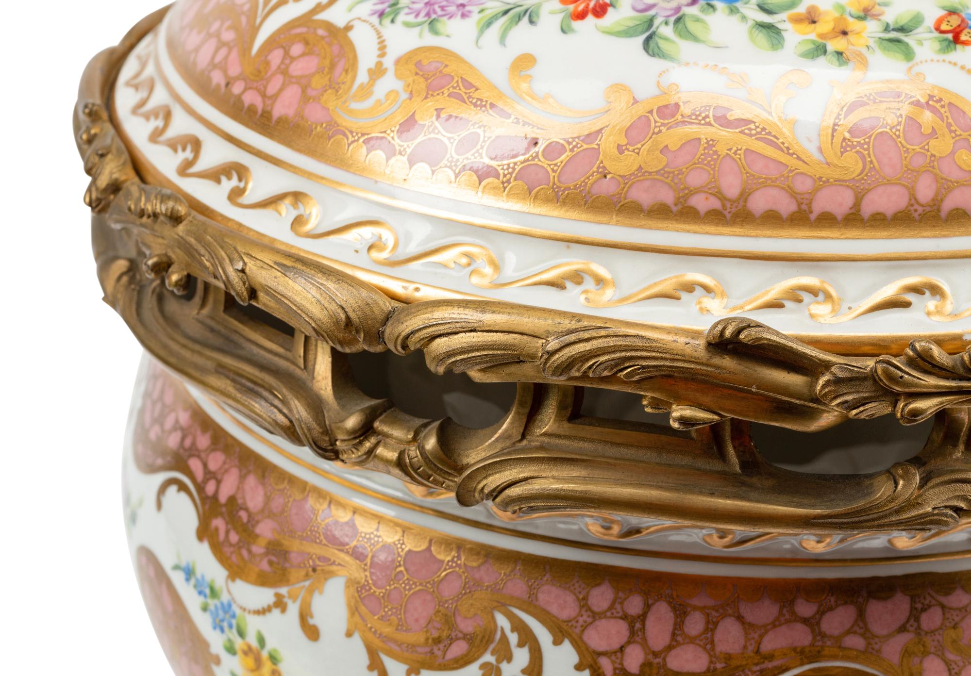 A Pair of French Gilt Bronze Mounted Sèvres Porcelain Potpourri Jars and Covers