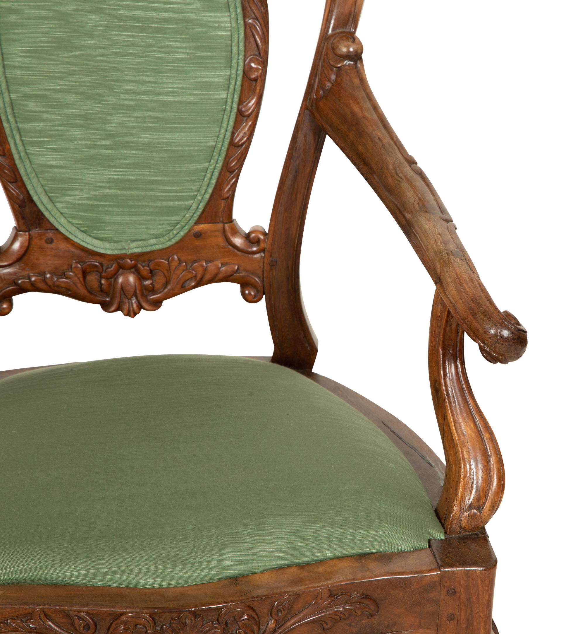 A Pair of Anglo-Colonial Tamarind Wood Armchairs