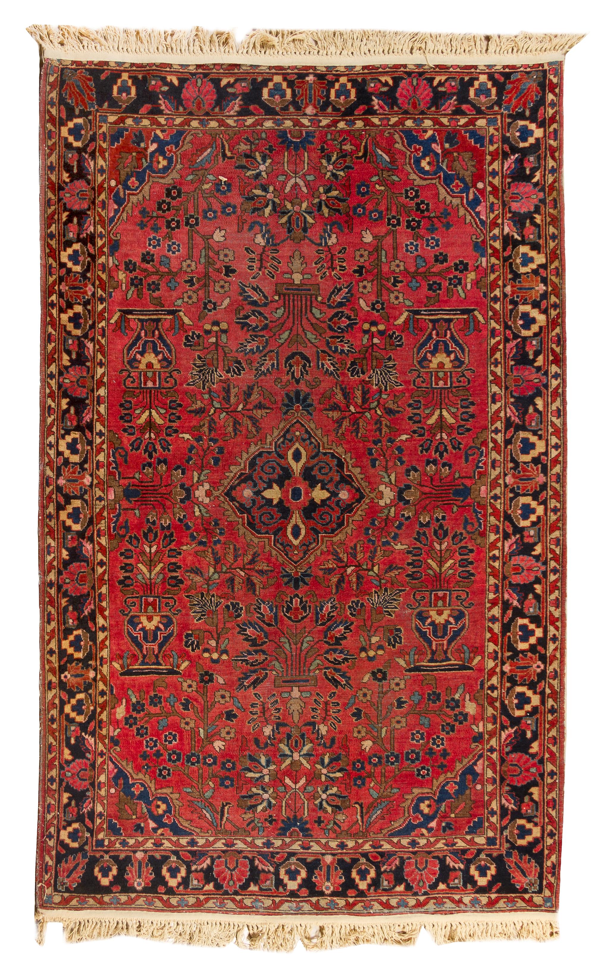 A Sarouk Wool Rug 6 feet 8 inches x 4 feet 5 inches.