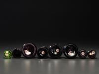 Eight Enameled Amethyst Glass Barber's Items