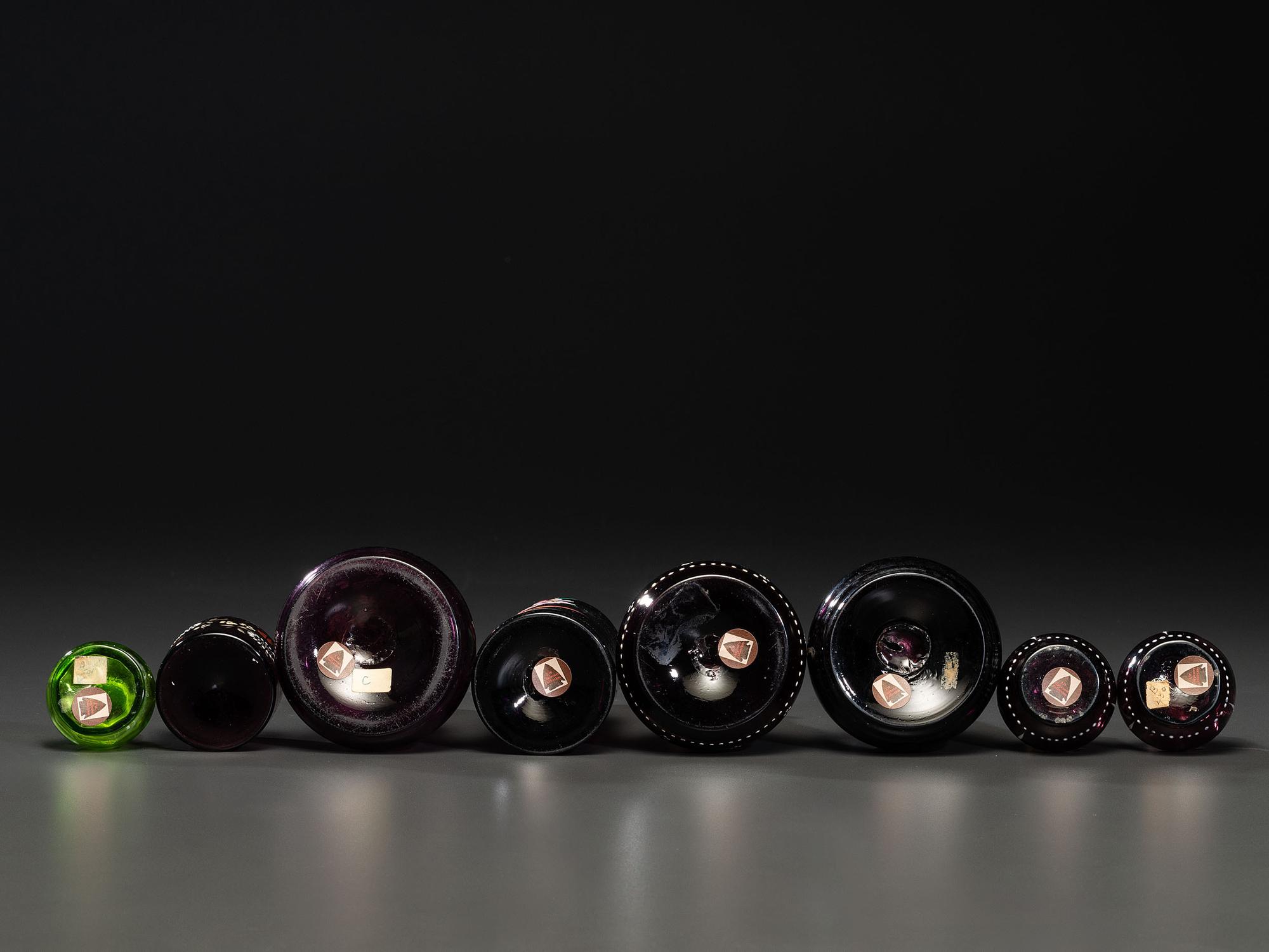 Eight Enameled Amethyst Glass Barber's Items