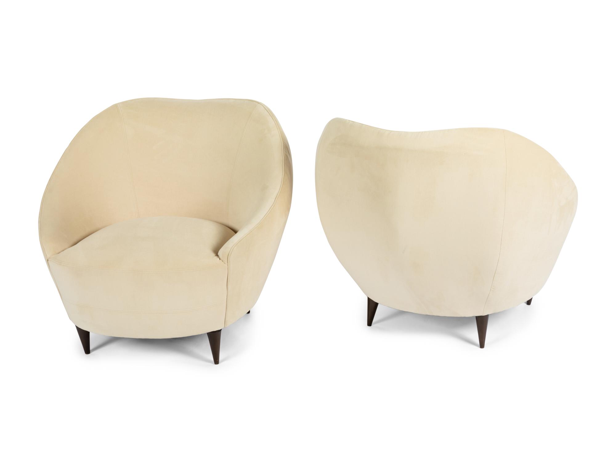 A Pair of Gondola Upholstered Lounge Chairs