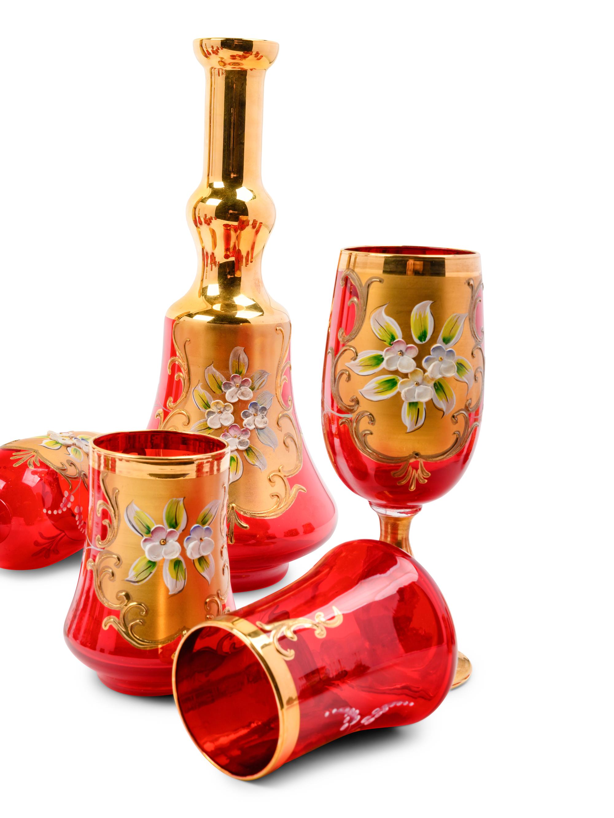 A Murano Gilt and Enamel Decorated Colored Glass Stemware Service