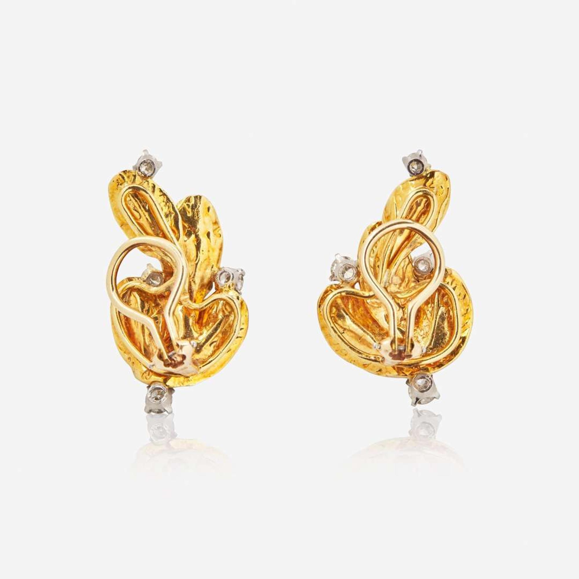 A Pair of 18K Yellow Gold and Diamond Ear Clips