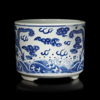 A Chinese Blue and White "Dragons" Tripod Porcelain Censer, Qing Dynasty — 清 青花云龍紋三足爐