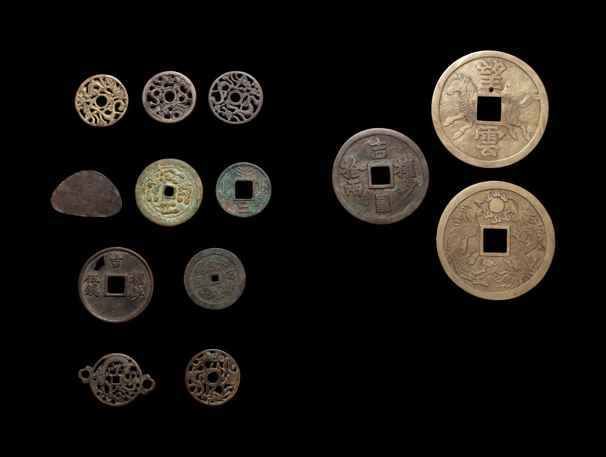 A Large Collection of Chinese Coins and Pendants