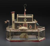 A Painted Sheet Metal and Wire Steamboat Form Birdcage