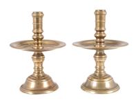 A Pair of Continental Brass Heemskirk Candlesticks