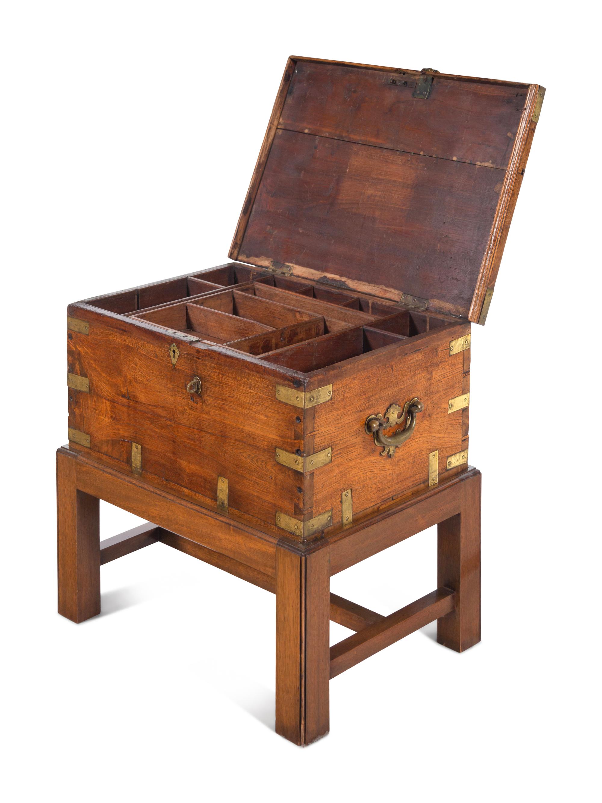 An Anglo-Colonial Brass Mounted Hardwood Campaign Trunk on a Later Stand