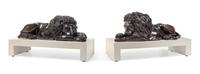 A Pair of Continental Bronze Models of Recumbent Lions