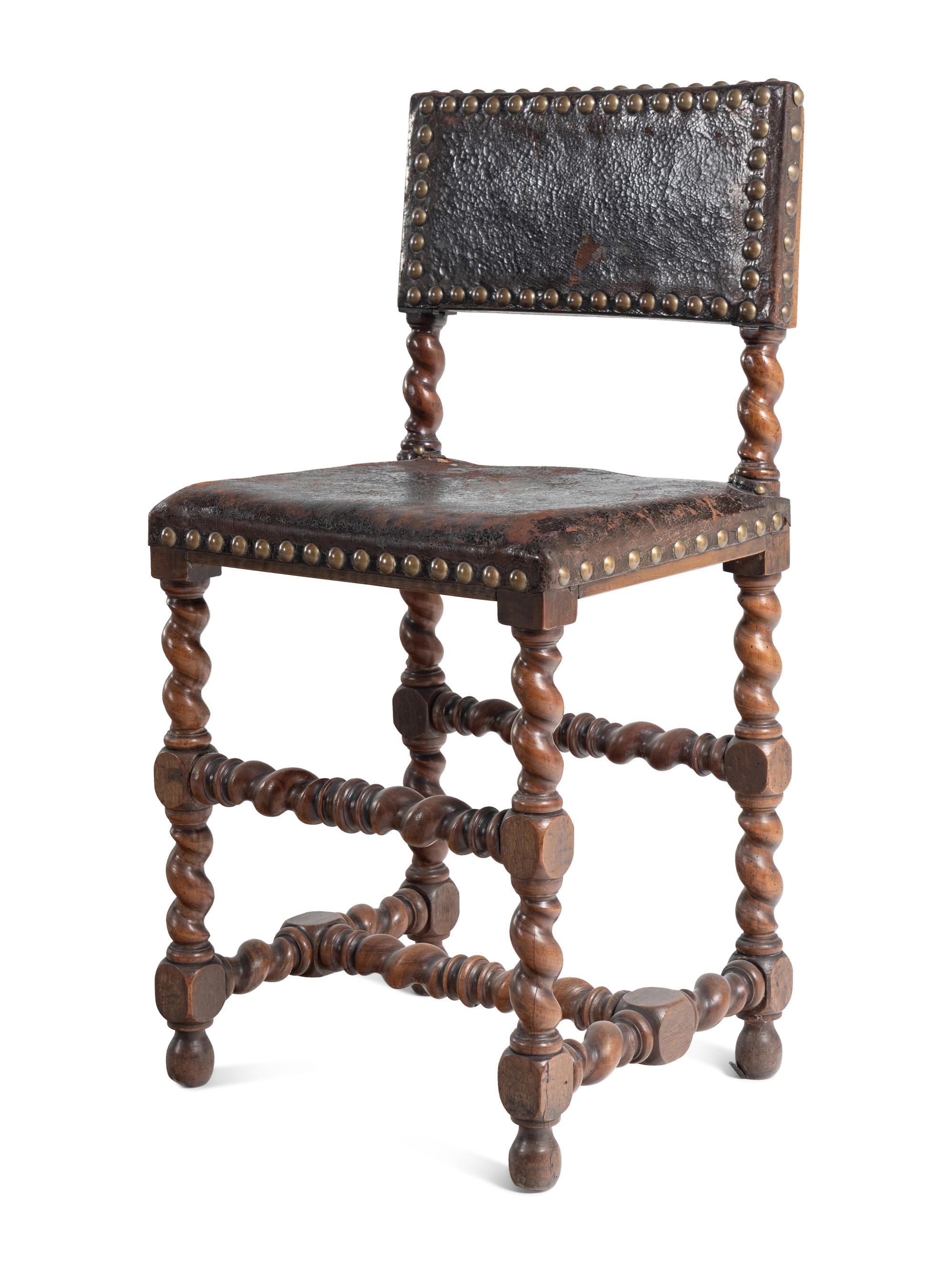 A Set of Six Spanish Baroque Style Walnut Dining Chairs