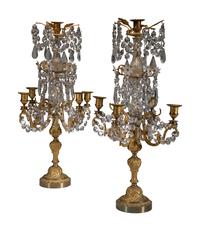 A Pair of Gilt-Bronze and Crystal Five-Light Candelabra