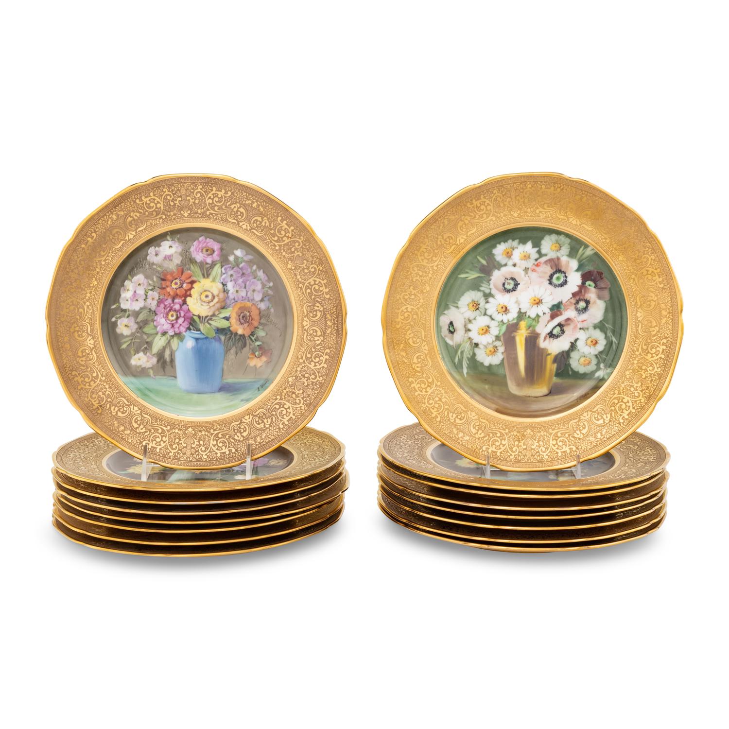 A Set of Sixteen Continental Gilt and Polychrome Painted Cabinet Plates