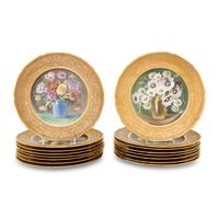 A Set of Sixteen Continental Gilt and Polychrome Painted Cabinet Plates