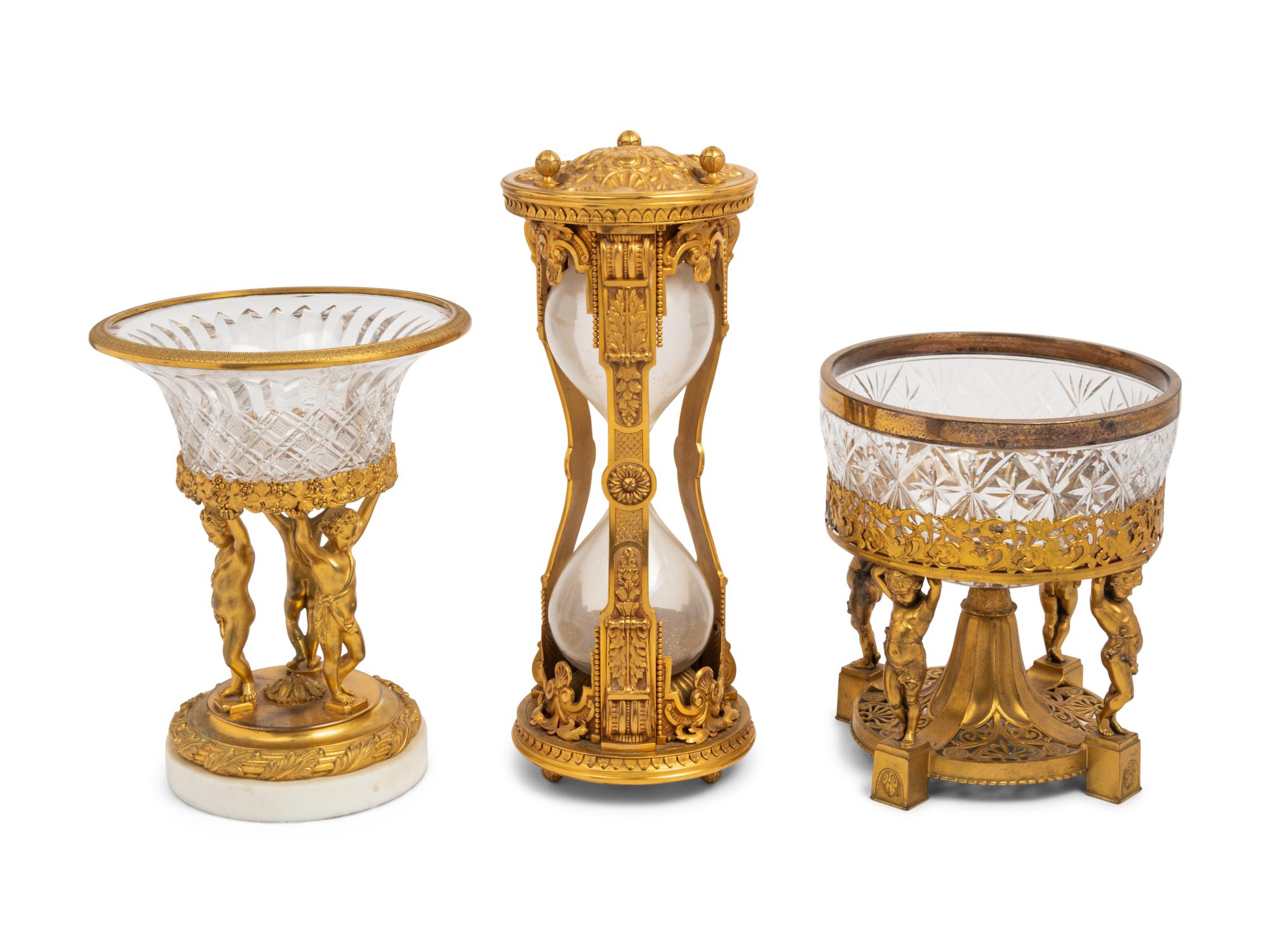 A French Gilt Bronze Mounted Hourglass and Two Associated Figural Centerpiece Bowls
