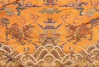 A Orange Ground Brocade Woven Silk 'Dragon' Panel
