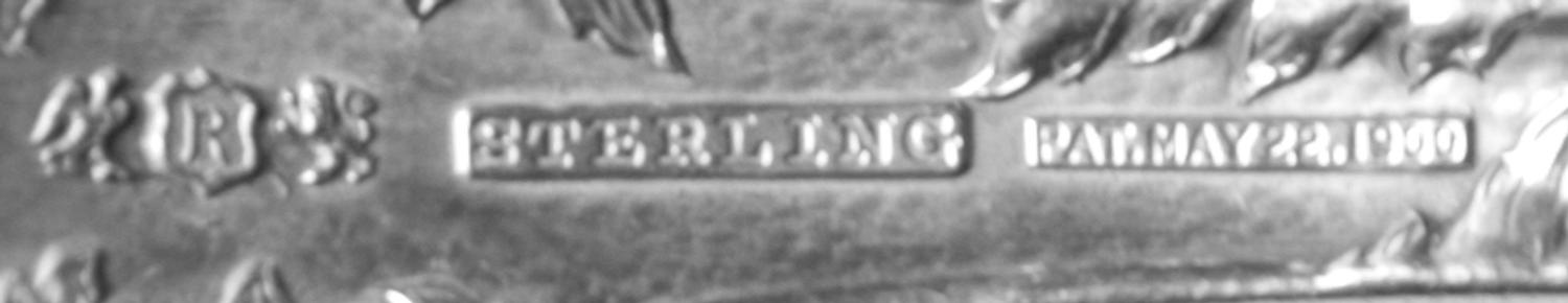 An American Silver Flatware Service, Reed and Barton, Taunton, MA, Les Cinq Fleurs pattern, comprising: 8 dinner knives 6 luncheon kniv