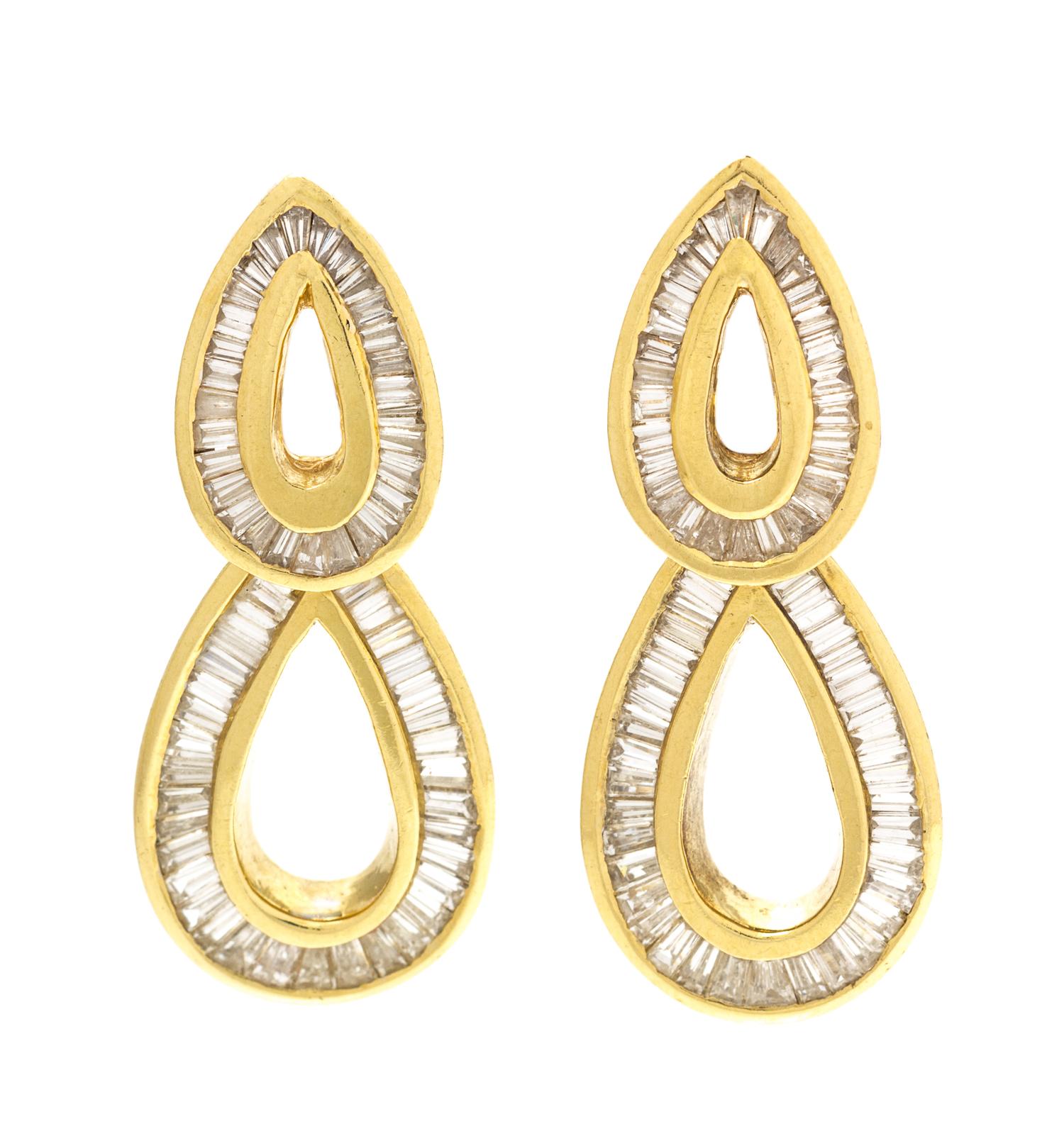 A Pair of 18 Karat Yellow Gold and Diamond Earclips, 12.50 dwts.